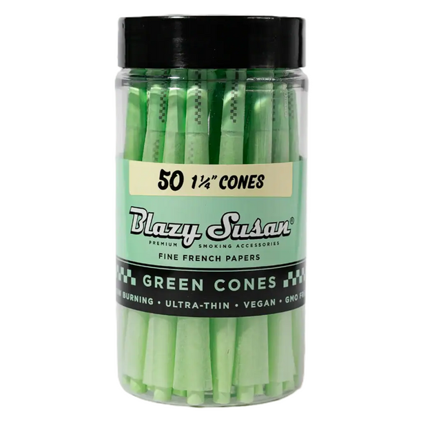 A clear plastic jar of Blazy Susan Green Cones with a black lid and a light green label, containing 50 thin green paper cones.
