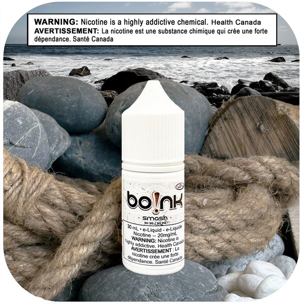 Boink e-liquid bottle on a rocky beach with a Health Canada warning label.