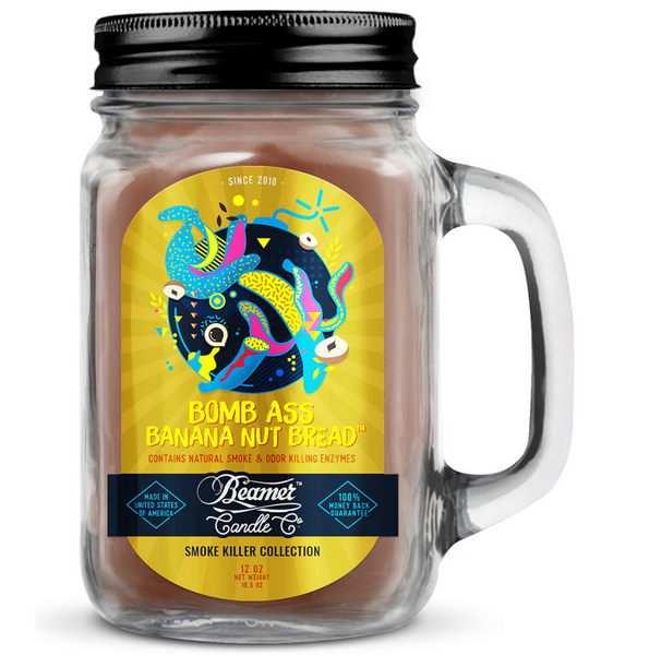 Jar candle with colorful label featuring a horse design, labeled 'Bomb Ass Banana Nut Bread', on a white background.