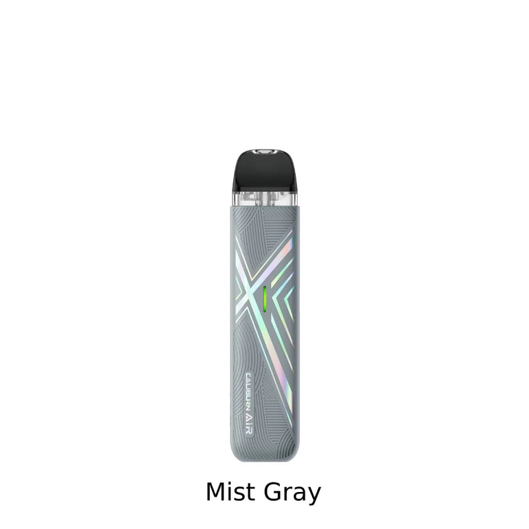 A single vape device shown upright on a plain white background with the text 'Mist Gray' below it. The device is primarily mist gray with a black mouthpiece and small iridescent geometric accents on the front.