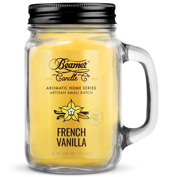 Beamer Candle in a glass jar with a black lid on a white background