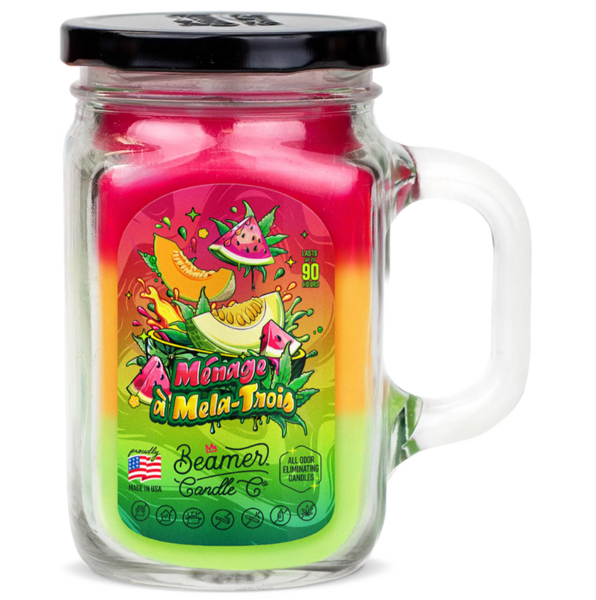Jar candle with colorful label featuring watermelon design on a white background
