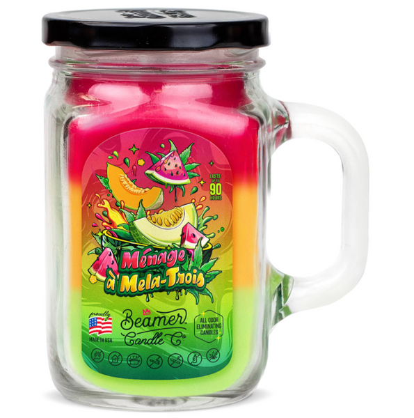 Jar candle with colorful label featuring watermelon design on a white background