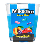 Scented candle in a glass container with blue packaging featuring Mike and Ike branding and berry blast flavor.