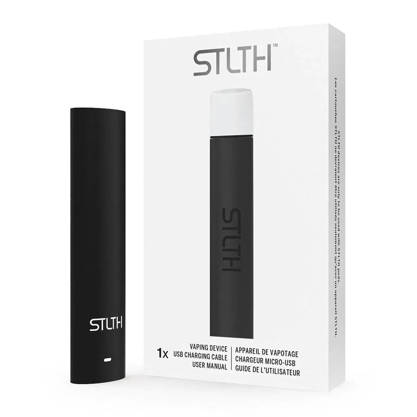 A black STLTH vaping device standing next to its white retail packaging box, which displays the STLTH logo and product details in English and French.