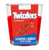 Twizzlers Strawberry scented candle in a glass container with red wax.