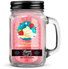 Glass candle jar with a colorful label featuring ice cream and strawberries on a white background