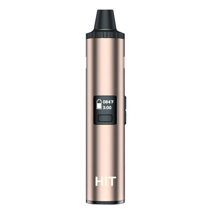 A gold Yocan Hit Dry Herb device with a small digital display showing temperature and time, set against a plain white background.