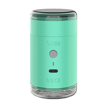 A green Yocan Yeke Electric Grinder with a clear top and bottom, featuring the Yocan and VEKE logos on the front, set against a plain white background.