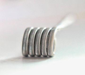 Fogg Jigger coil displayed on blurred background.