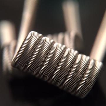 Fogg Jigger Coil  displayed on dark blurred background.